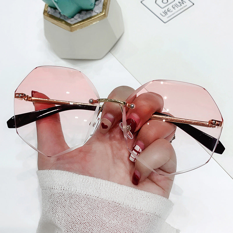 Wholesale New Metal Frameless Polygon Ladies PC Sunglasses